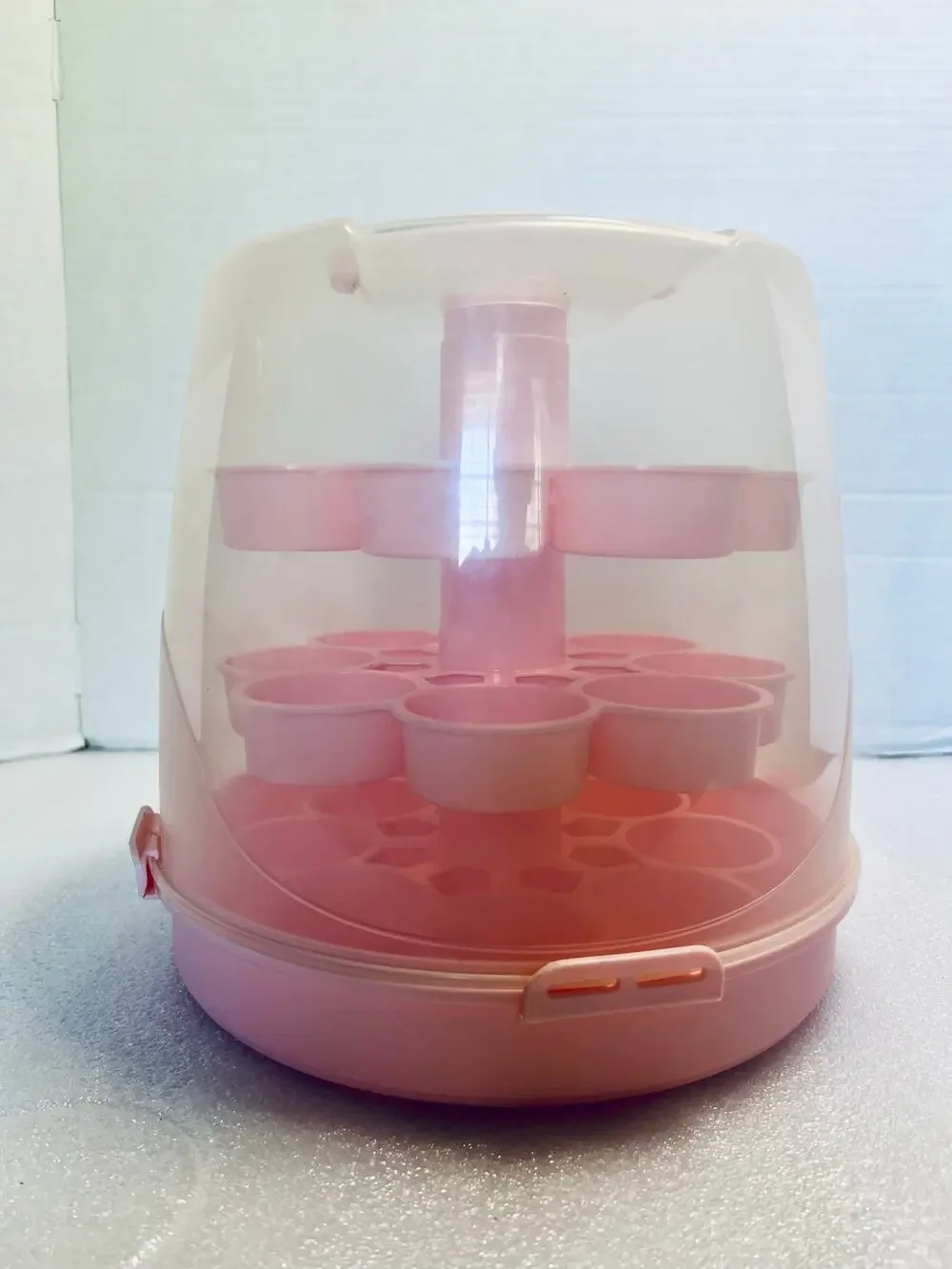 Pink Cup Cake Carrier.  Holds 12 Cup Cakes.  Can be disassembled.  Plastic